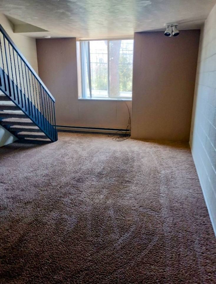 THE QUADS APARTMENTS - Photo 4 of 6