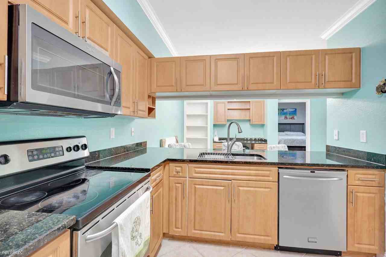 6418 Emerald Dunes Dr #204 - Photo 2 of 15