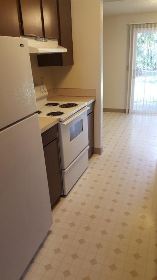 ARBORCREST APARTMENTS - Photo 2 of 5