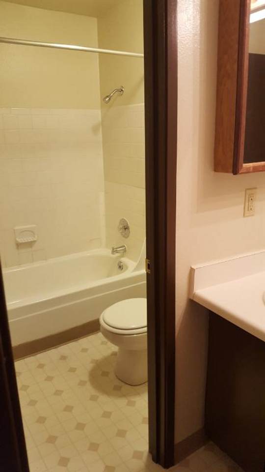 ARBORCREST APARTMENTS - Photo 4 of 5