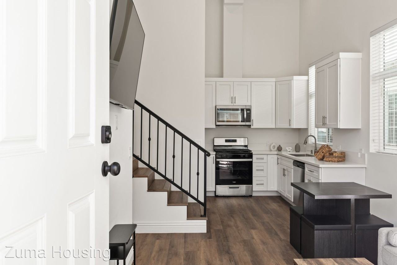 A 4 Bedroom apartment with Private Ensuite Bathrooms, common areas and a fully functional kitchen at 1713 Kelton Ave. - Photo 2 of 38