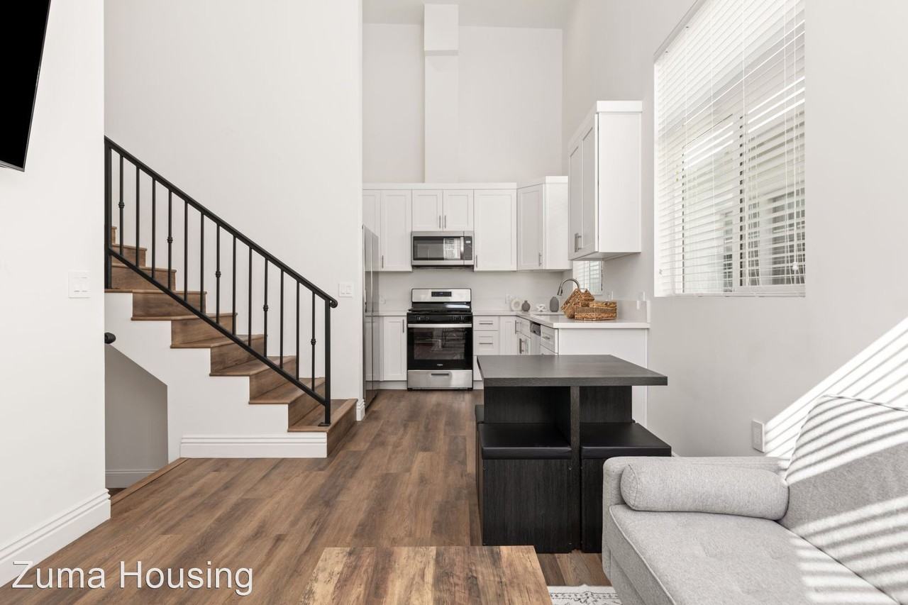 A 4 Bedroom apartment with Private Ensuite Bathrooms, common areas and a fully functional kitchen at 1713 Kelton Ave. - Photo 3 of 38