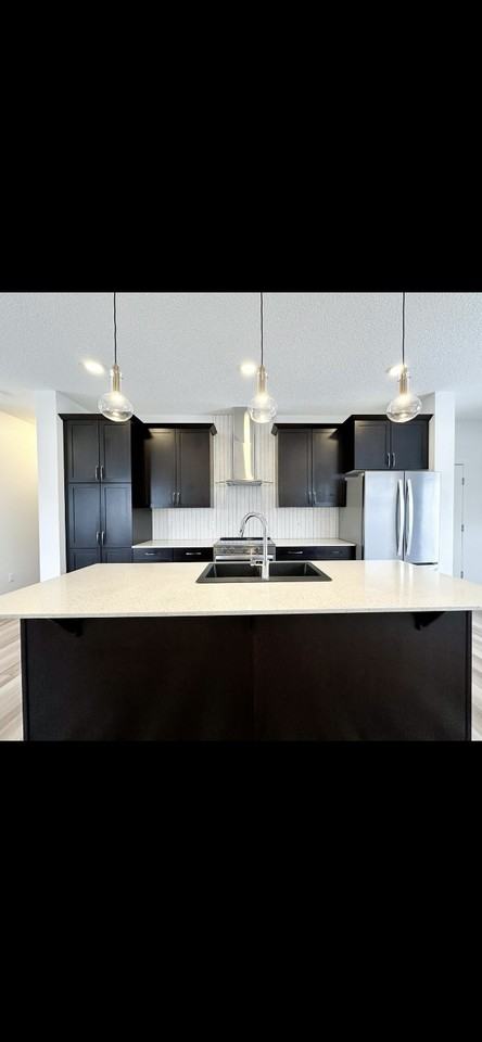 1308 McConachie Blvd NW - Photo 2 of 12