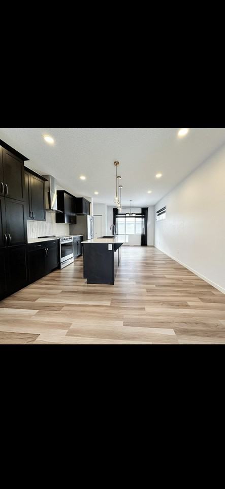 1308 McConachie Blvd NW - Photo 3 of 12