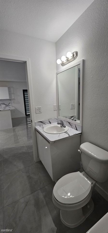 3072 NW 59th St - Photo 3 of 8