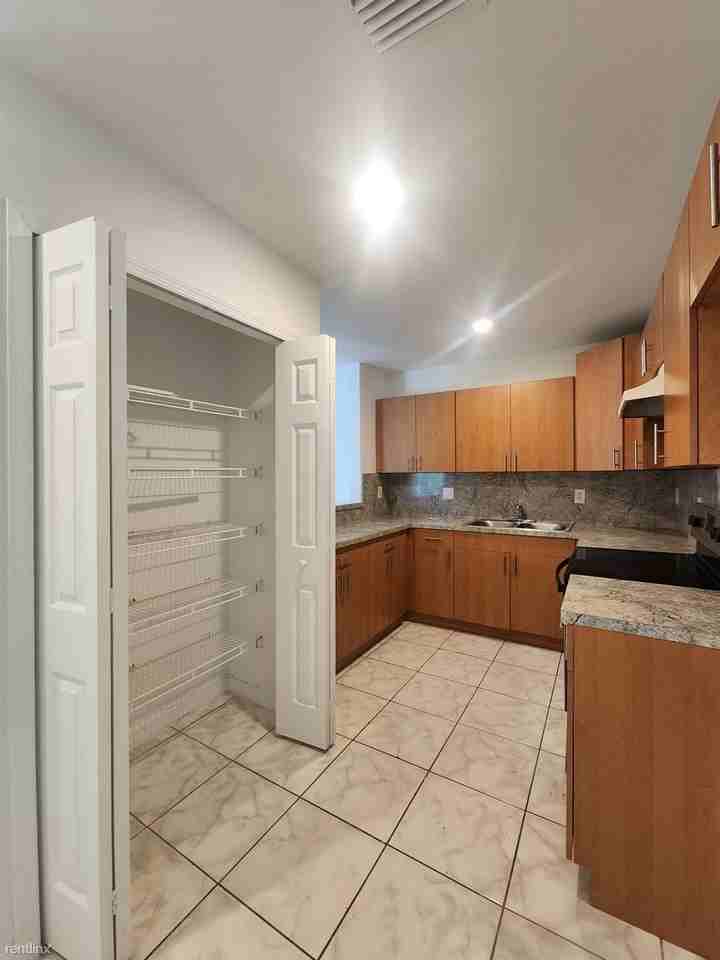 7500 NW 19th Ave - Photo 2 of 12