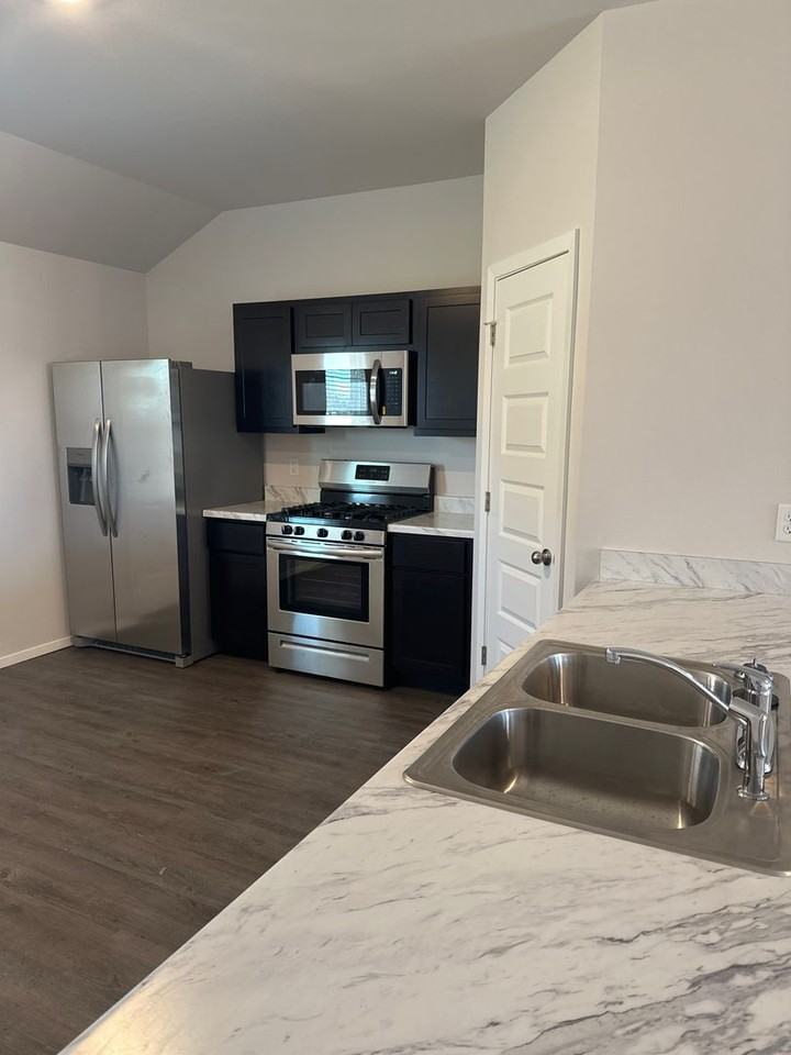 8302 E 163rd St S - Photo 6 of 13