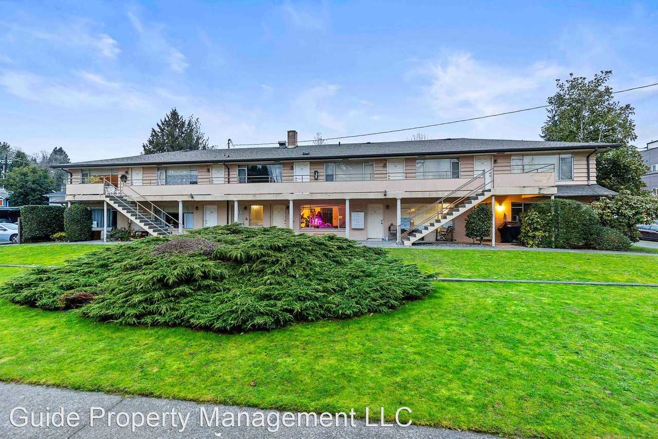 Village Green Apartments - Photo 2 of 8