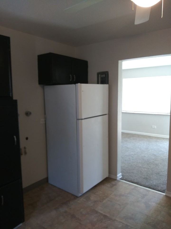 8335 West 16th Place - Photo 3 of 9