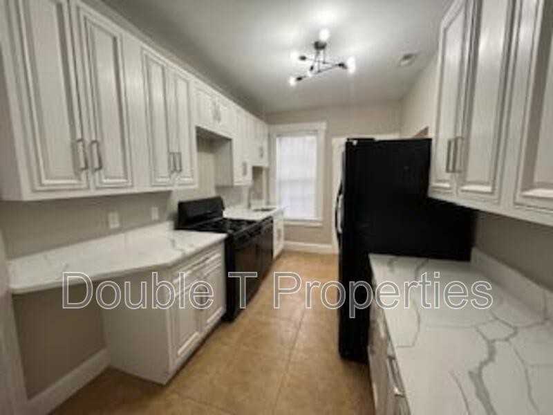 3406 Wilkens Ave - Photo 7 of 14