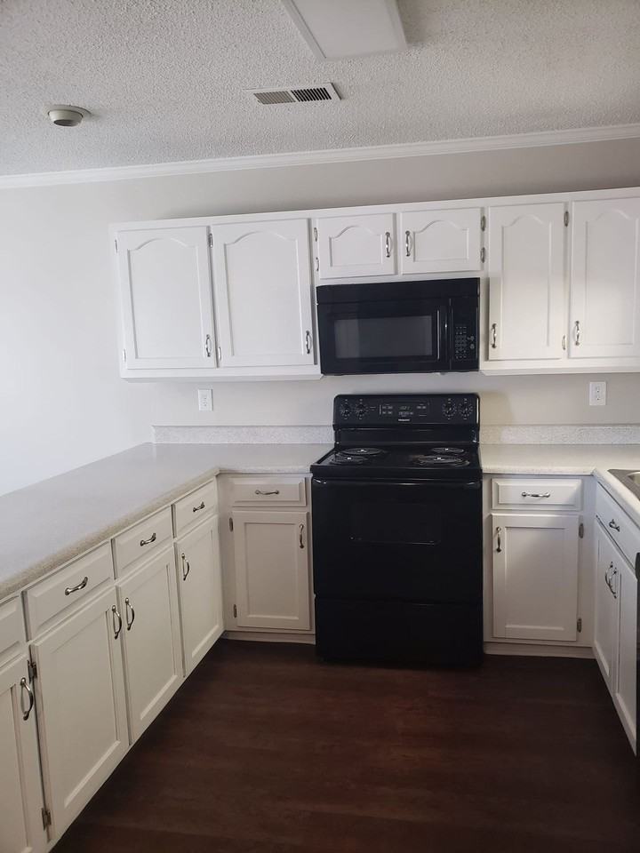 NORTH VILLAGE NEW - Photo 2 of 4