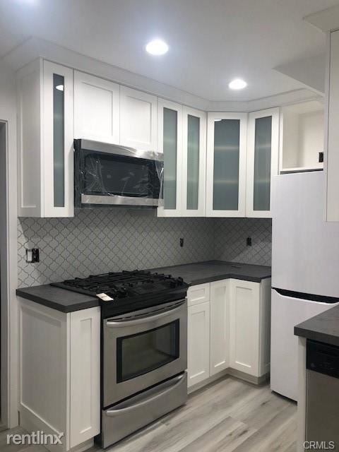 214 42nd St - Photo 3 of 4