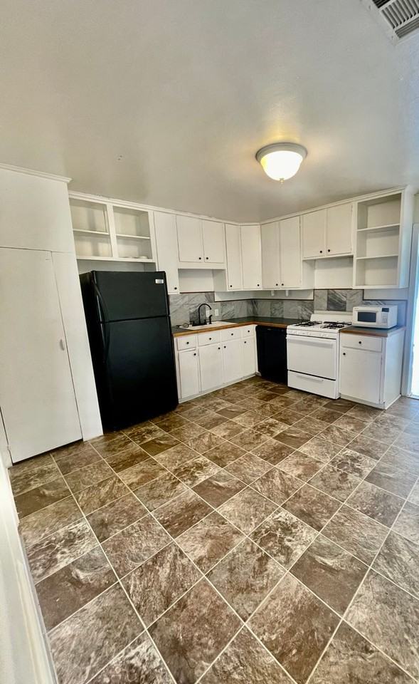 220 S 70th East Ave - Photo 4 of 13