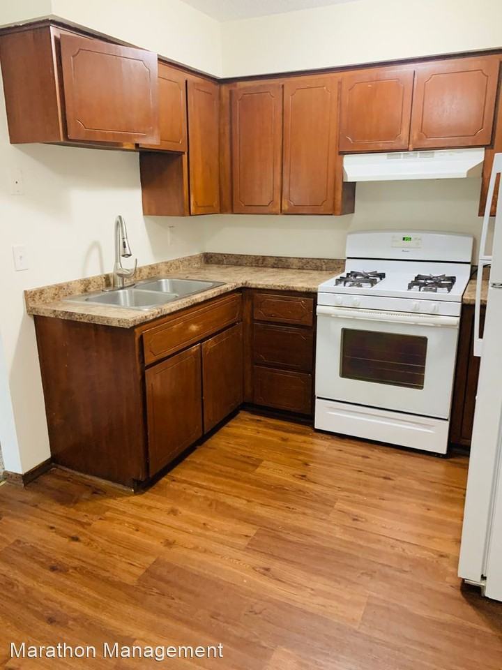 1121-1129 79th Avenue NE - Photo 2 of 2