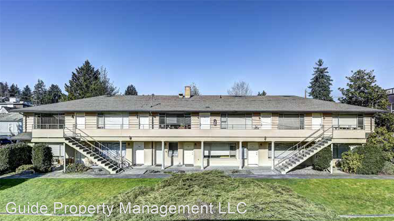 Village Green Apartments - Photo 3 of 8