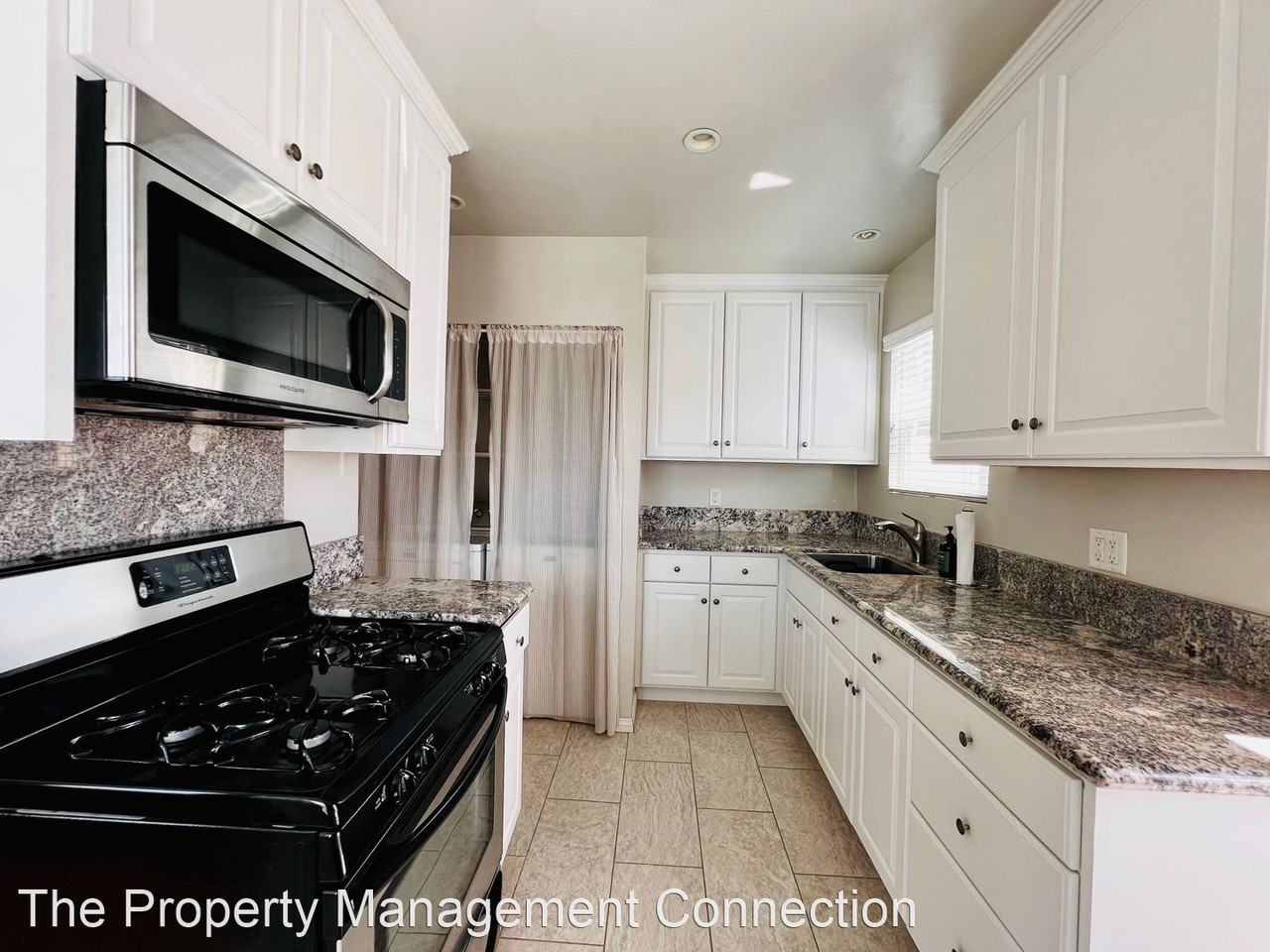 5725 E 2nd St - Photo 3 of 13