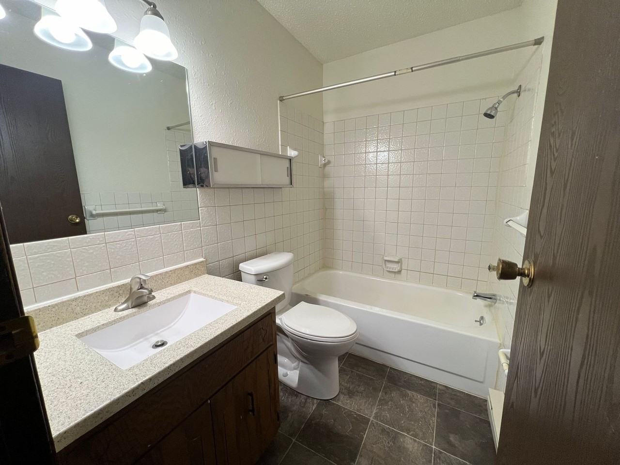 Melony Ann Apartments - Photo 5 of 7