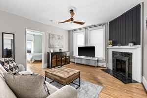 featured image of 209 E 3rd St