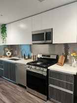 Brand New Building featuring 1 & 2 bedroom Flats & Townhomes! - Photo 1 of 1