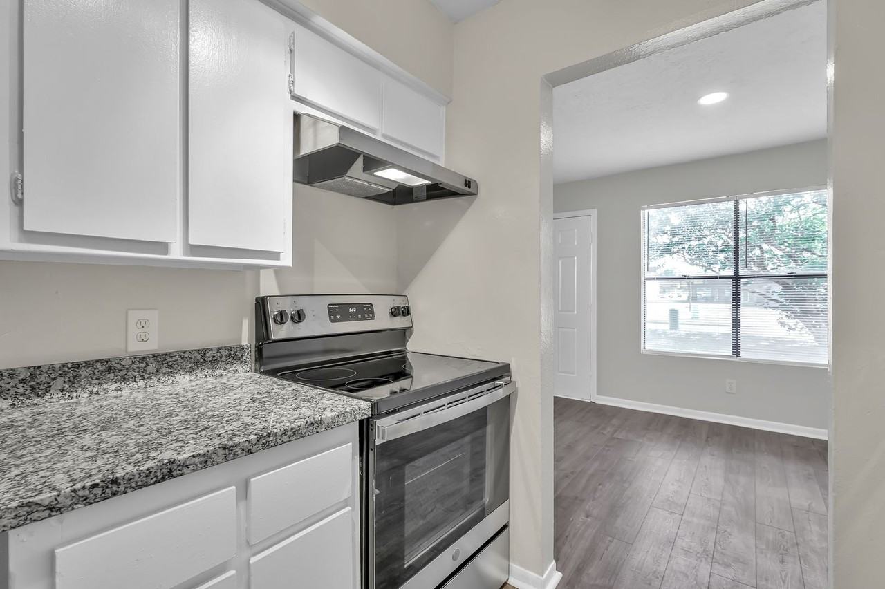 Woodcreek Apartments - Photo 2 of 17