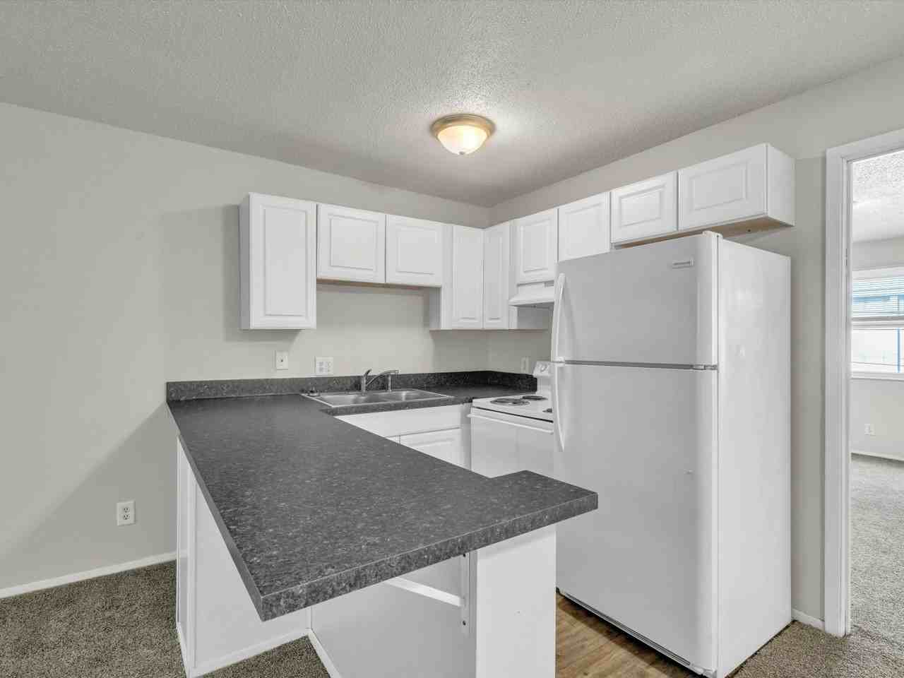 Richardt Apartments - Photo 2 of 24