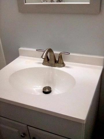 PARAMOUNT APARTMENTS - Photo 4 of 7