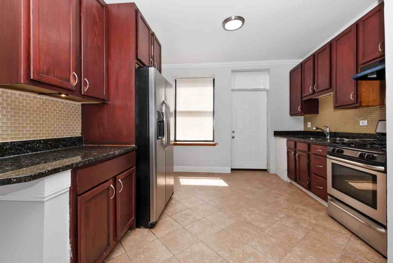 7217 S Yates Blvd - Photo 6 of 14