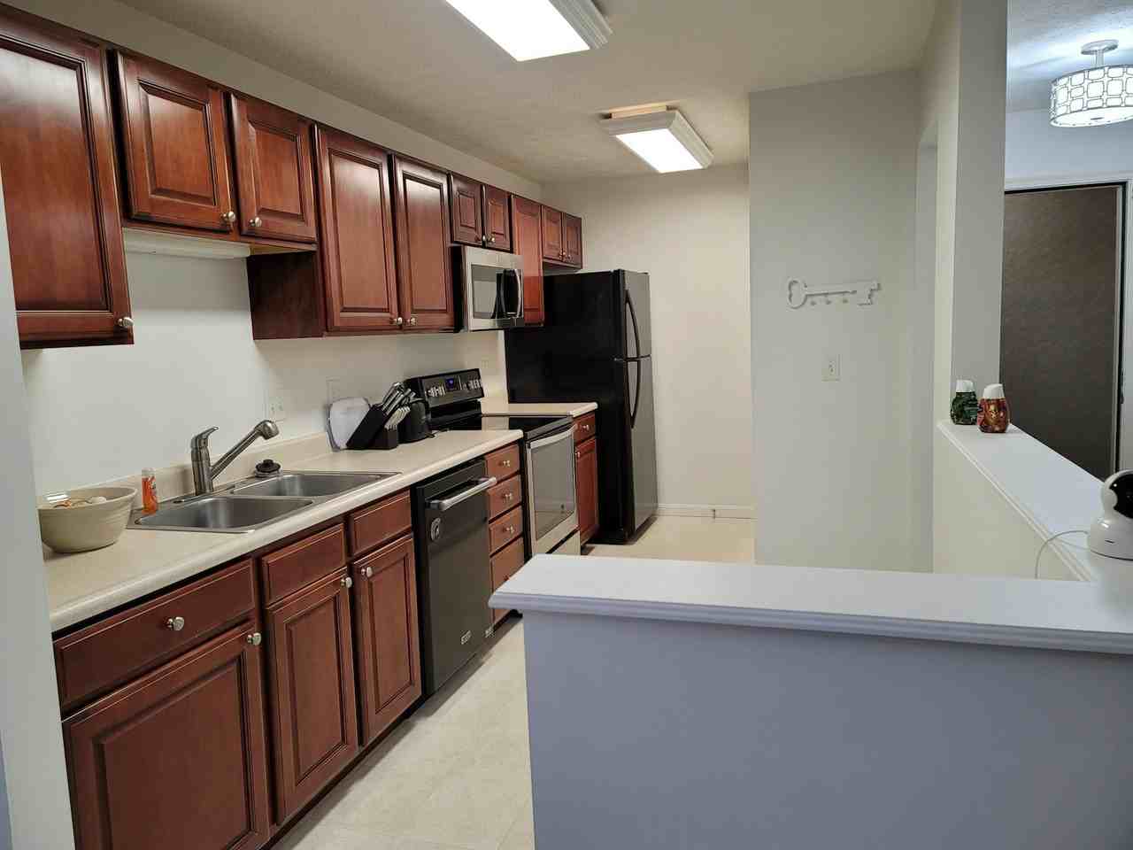 3126 Alexander Place, Unit 104 - Photo 3 of 9