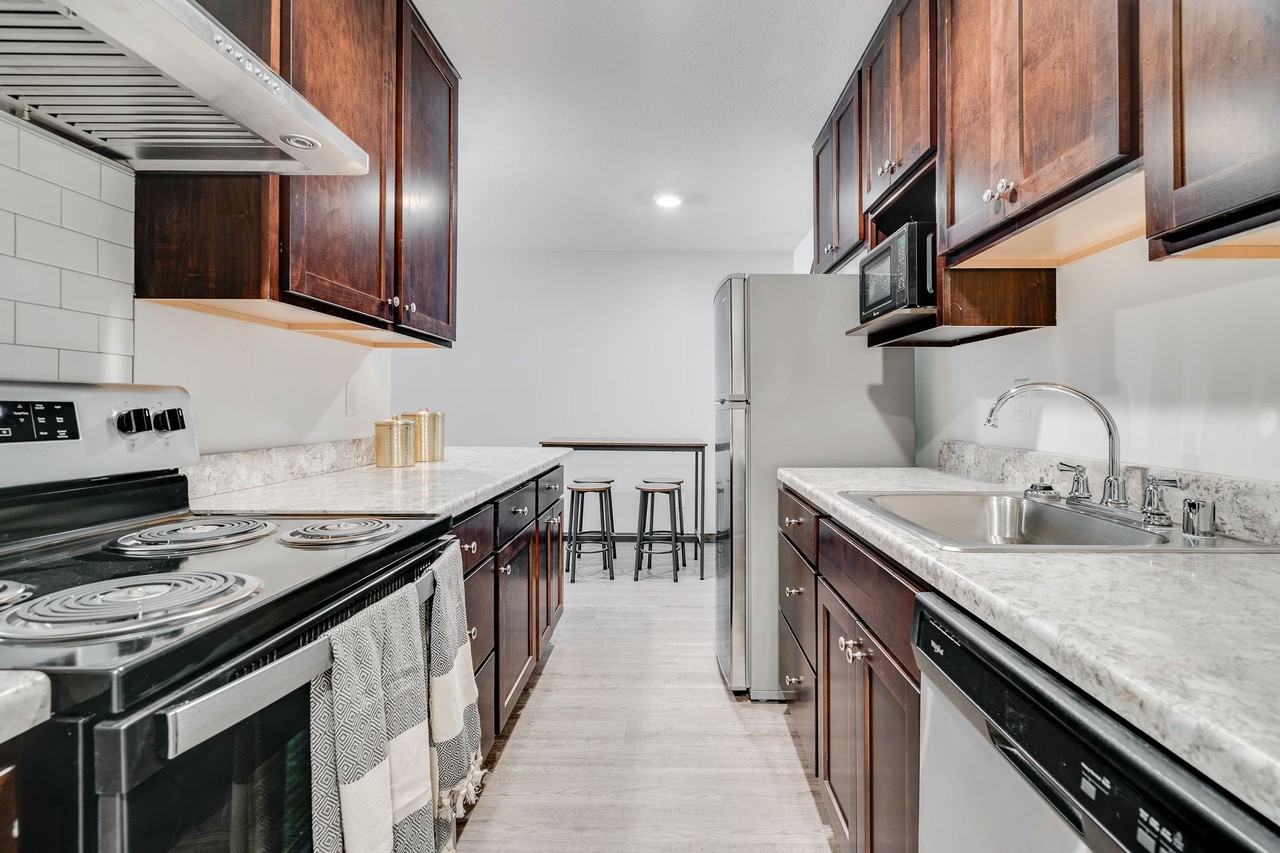 Fine Living at Aquila Park & Royal Park - Photo 5 of 27