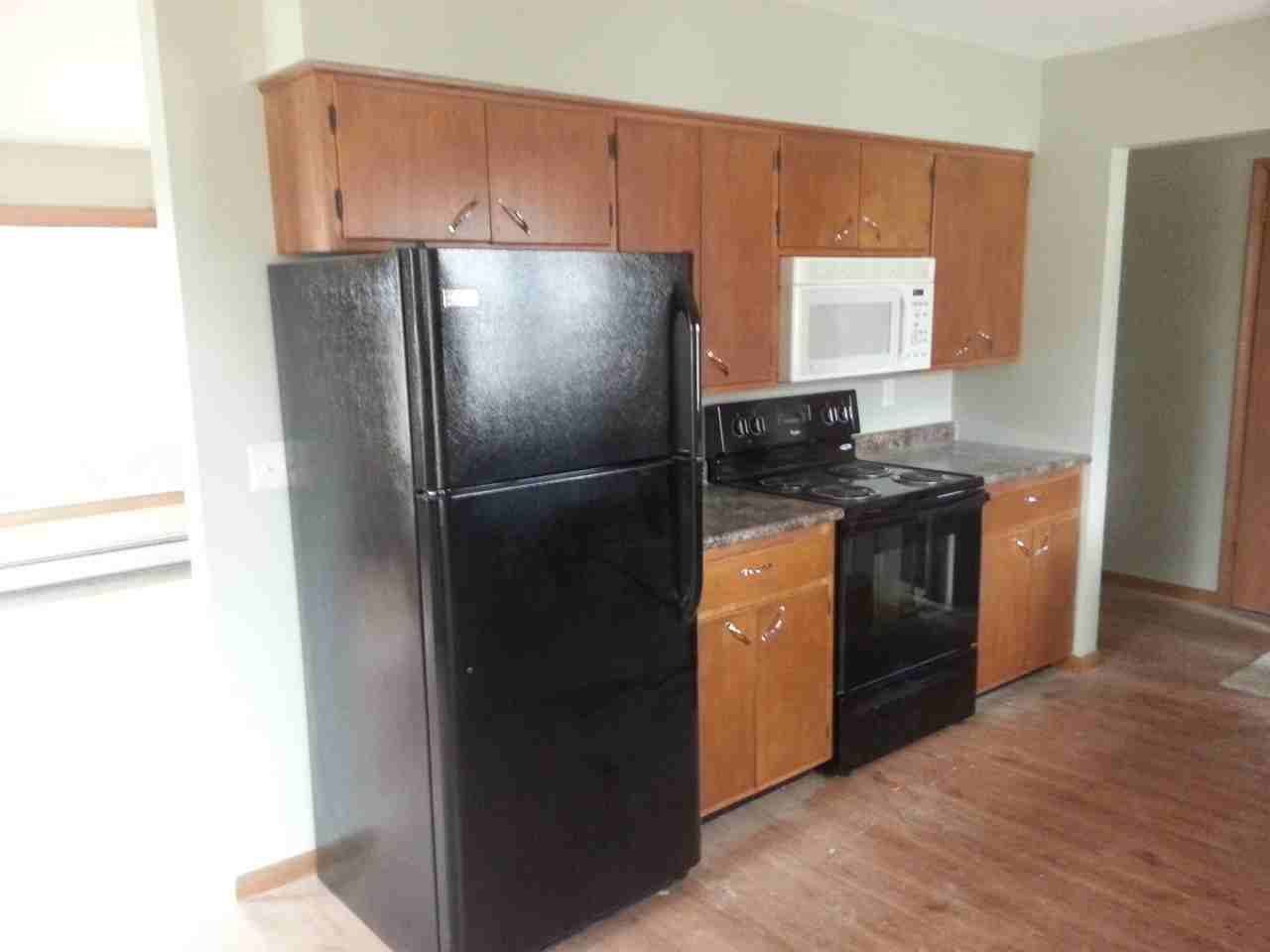 704 7th St W #1 - Photo 3 of 5