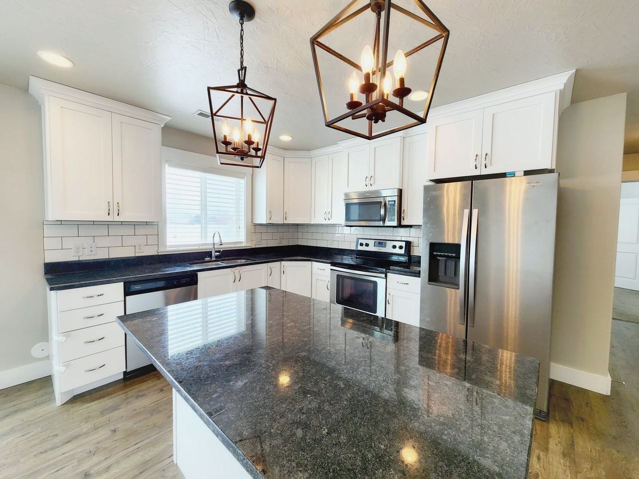 1050 Nibley Pkwy - Photo 3 of 38