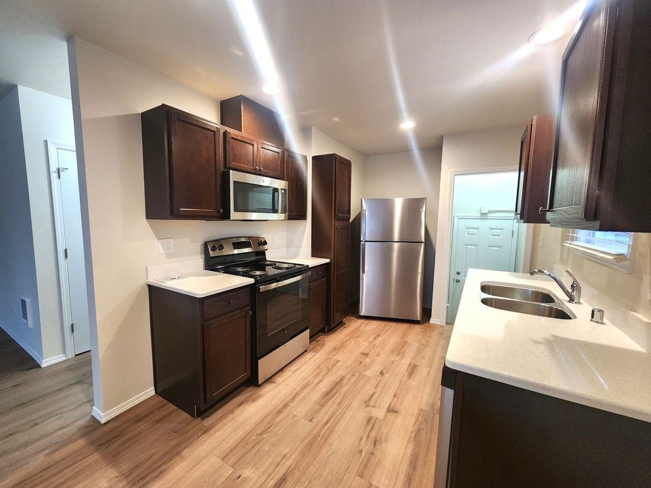 Fully Renovated Townhomes! Brand New Stainless Steel Appliances! & Bonus Area! - Photo 2 of 49
