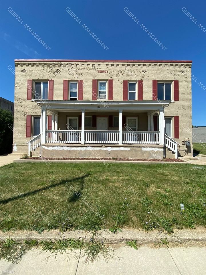 1001 N. Saginaw St. - Photo 2 of 2