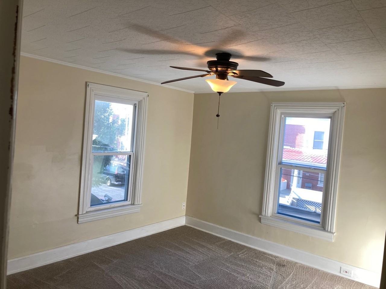 211 W 4th St - Photo 5 of 9
