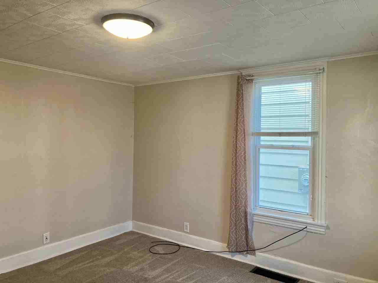 211 W 4th St - Photo 7 of 9