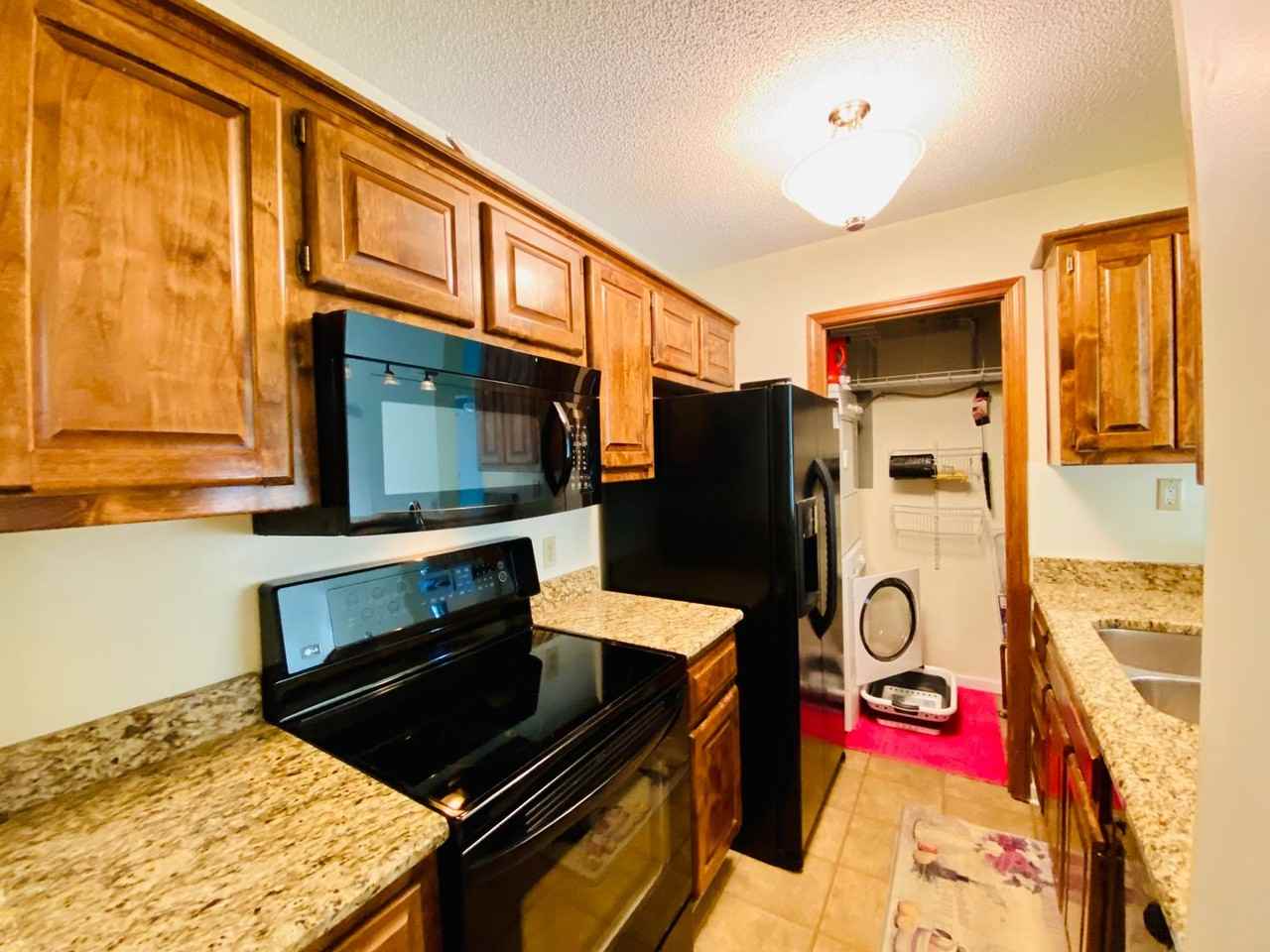 12030 W 58th Ter - Photo 3 of 26