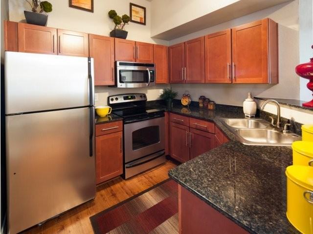 Carriage Homes Of Signature Place - Photo 3 of 10