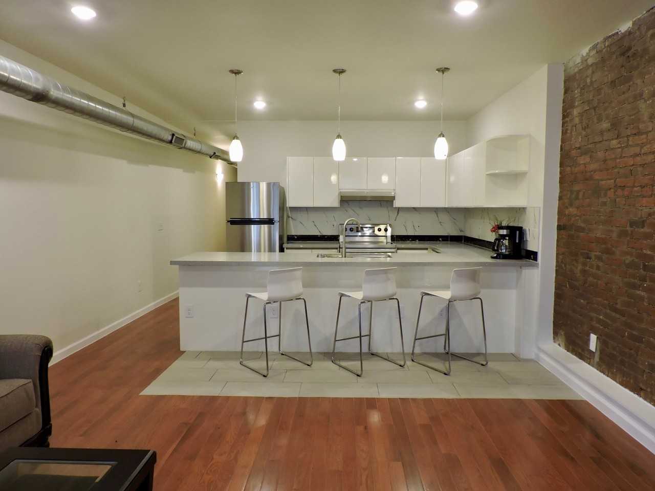 309 Sycamore Street Apartments - Photo 6 of 50