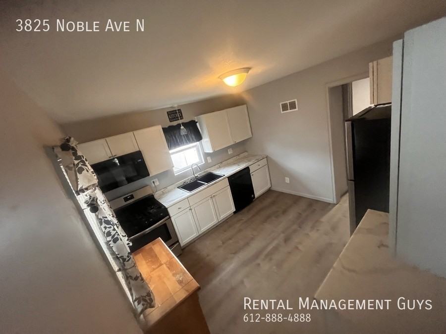 3825 Noble Ave N - Photo 3 of 13