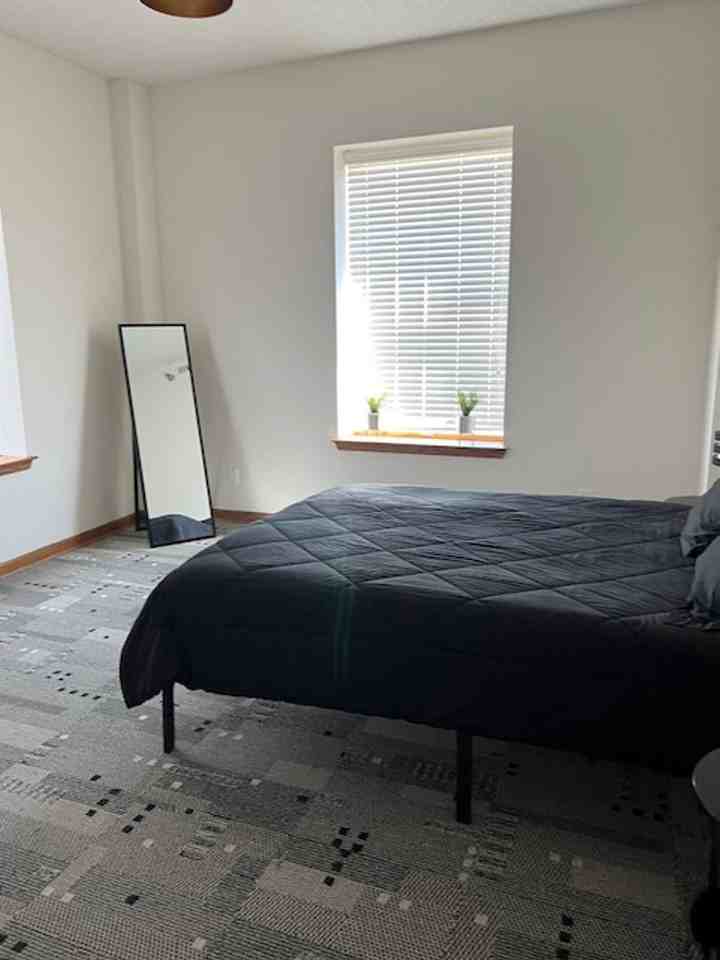 Booth Residences - Photo 7 of 8