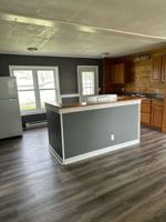 featured image of 107 W 3rd St