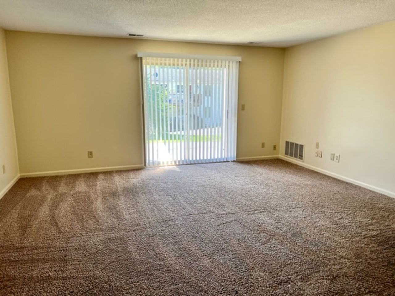 DAY GARDEN APARTMENTS - Photo 2 of 7