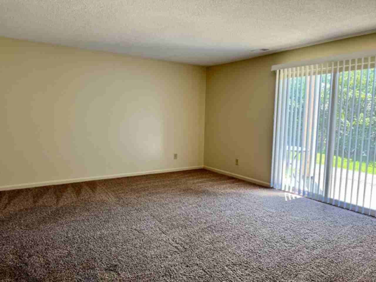 DAY GARDEN APARTMENTS - Photo 3 of 7