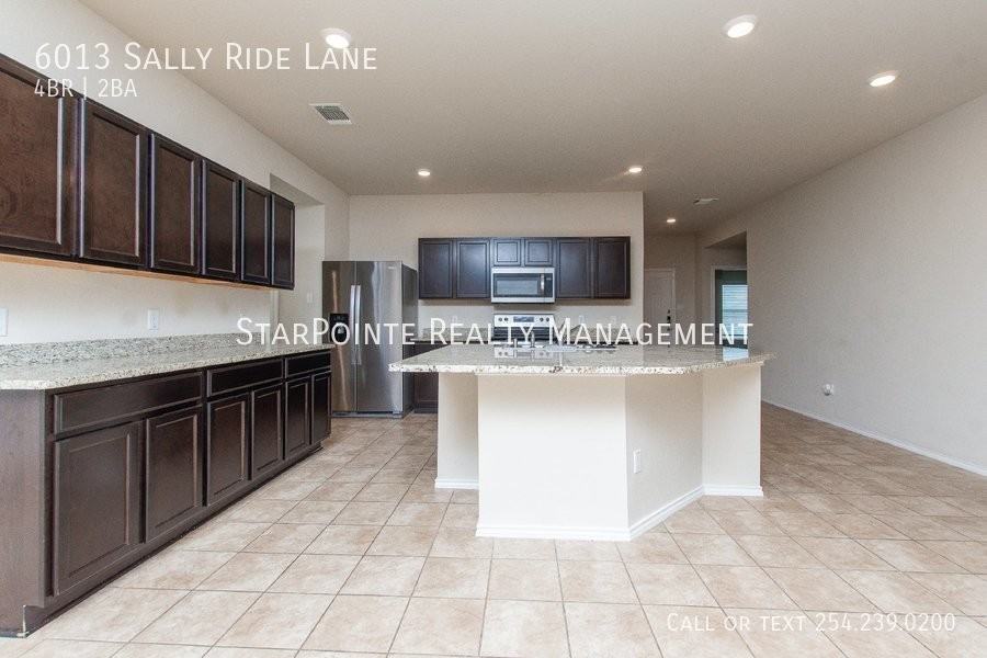 6013 Sally Ride Ln - Photo 7 of 26