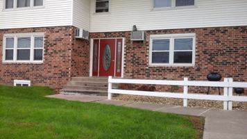 featured image of 209 E 11th St