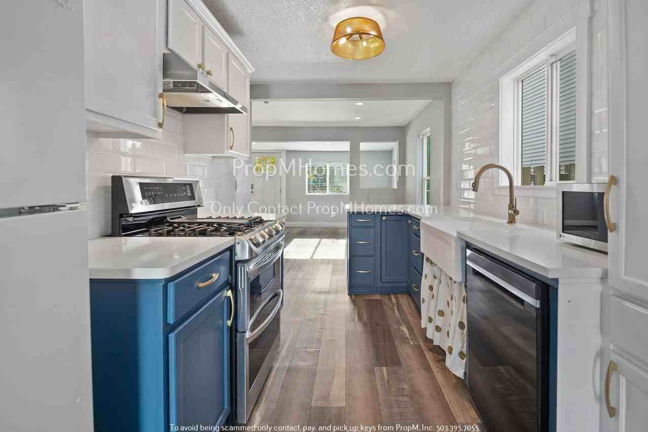 12235 Se Ellis St - Photo 6 of 25