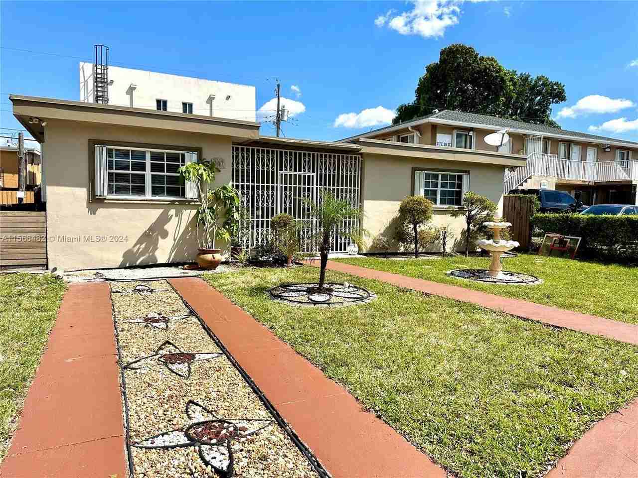 307 E 5th St - Photo 2 of 8