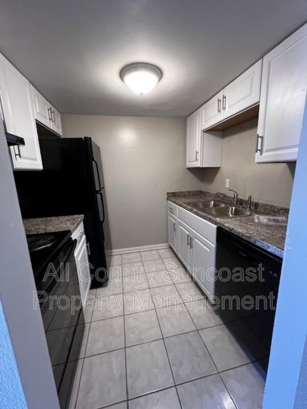 6570 66th Ave N #210 - Photo 2 of 10