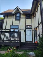 featured image of 528 W 6th St