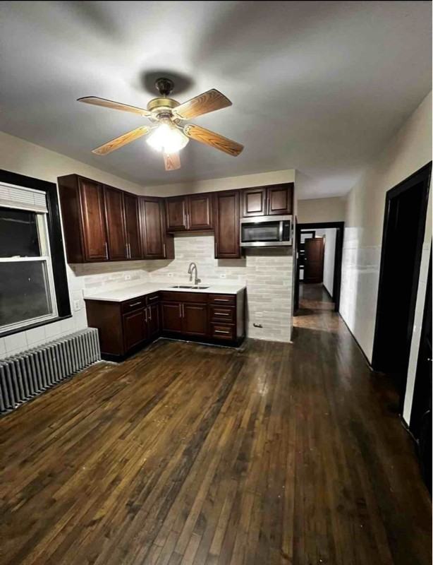 5211 S Mozart St #2 - Photo 2 of 8